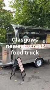 A couple visits a new Malaysian street food truck called Rasa Sambal in Glasgow, reviewing their curry puffs, Maggi Goreng, and Nasi Lemak while eating on a park bench.