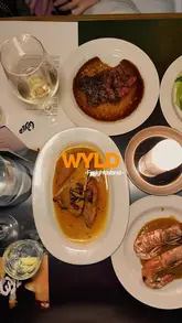 A promotional reel for WYLD in Newcastle, showcasing the venue's open kitchen, live fire cooking, cocktails, and live entertainment.