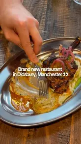A first-person vlog-style review of a new restaurant, Arcadian, in Didsbury, Manchester, showcasing the interior, cocktails, and a variety of dishes including scallops, lamb chops, monkfish, and dessert.