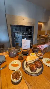 A short, visually appealing video showcasing a Michelin-starred breakfast experience at The Angel at Hetton, featuring close-ups of high-quality breakfast dishes and the cozy interior of the venue.
