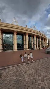 A family vlog showcasing a day out at the Trafford Centre, highlighting activities like adventure golf, laser quest, and a visit to a frozen yogurt shop.