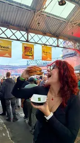 A vlog-style review of the 'Live From The Grill' food festival in Manchester, featuring various BBQ and street food vendors, live music, and a lively atmosphere.