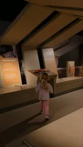 A montage of a family visit to the Discovery Museum in Newcastle, showcasing various interactive exhibits suitable for toddlers.