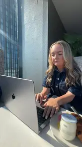 A day-in-the-life style vlog showcasing a coworking space at the Manchester Deansgate Hotel. The creator highlights the lounge area, the views, the complimentary snacks and drinks, the lunch options, and the wellness facilities including the gym and swimming pool.