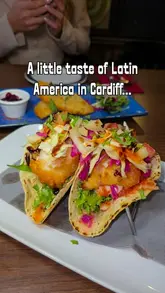 A vibrant montage showcasing the food and drink menu at Vivo Latino in Cardiff, featuring close-ups of tacos, sizzling fajitas, curry, and various cocktails, alongside shots of the venue's colourful Latin American-inspired decor.