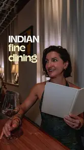 A promotional reel for Kanishka Mayfair, featuring a variety of modern Indian fine dining dishes, including a signature chicken tikka pie, scallops, and lamb, alongside shots of the elegant restaurant interior and a guest enjoying the experience.