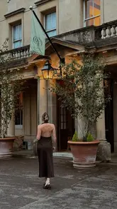 A split-screen 'day in the life' style video documenting a 48-hour staycation in the Cotswolds, featuring a hotel stay, a Volvo car, and leisure activities including dining and swimming.