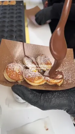Personalized pancake hut at wedding with delicious pancakes and toppings by Pancakehutuk. Perfect for unique wedding ideas.