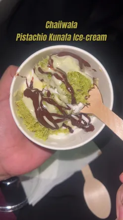 Viral pistachio ice cream from Chaiiwala, served in a colorful cup, perfect for foodies in London.
