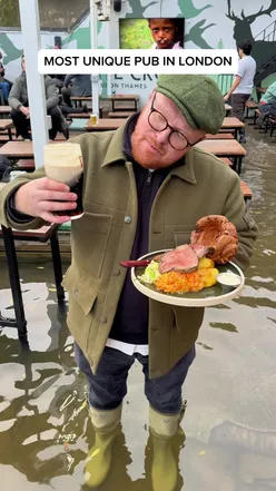 Flooded London pub interior with unique decor, perfect for dates or friends. Explore London's quirky pub scene.