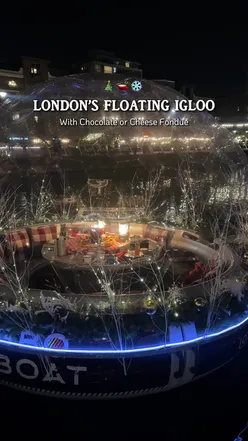 Cozy floating igloo dining in Canary Wharf, featuring fondue, mulled wine, and a scenic boat tour.