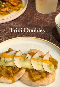Small plates and cocktails at Turtle Bay's bottomless brunch, featuring island flavors and a tropical vibe.