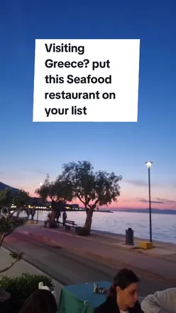 Fresh seafood dining at Patouras Fish Tavern in Xylokastro with grilled octopus, calamari, prawns, and stunning sunset views.