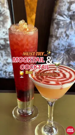 Customers enjoying vibrant mocktails at a trendy bar in Edinburgh during summer.