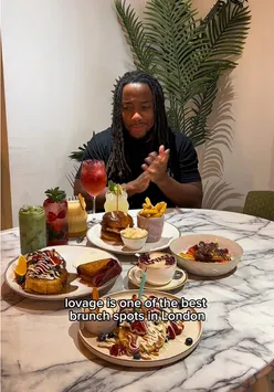 Brunch lovers enjoying dishes at LO'VAGE, a top brunch spot in London, with vibrant decor and friendly atmosphere.