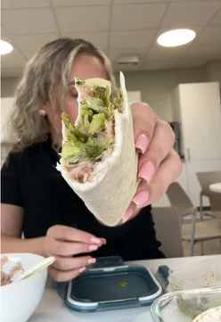 'Delicious tinned fish dinner served elegantly with fresh herbs and sides, showcasing culinary perfection.'