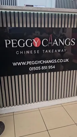 Friendly staff at Peggy Chang's serving delicious Chinese food in Glasgow, showcasing a busy yet welcoming atmosphere.