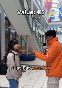 Students enjoying trivia games for vouchers at the Just Eat Freshers Roadshow event at DCU.