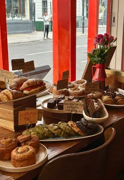 Exploring Notting Hill's best bakeries at Moi et Toi, Chai Guys Bakehouse, and Lisboa Patisserie on a bakery crawl.