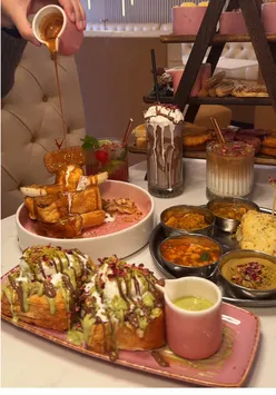 Brunch at Mi Amor in Walsall featuring breakfast tower, kunafa French toast, and colorful drinks.