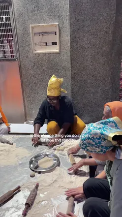 Traveler enjoying street food on ‘A Chefs Food Tour’ in Delhi, learning about Sikhism and riding a rickshaw.