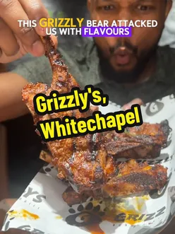 Hungry diners enjoying burgers, chicken, and milkshakes at Grizzlys in Whitechapel, a new hotspot for foodies.