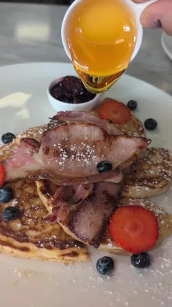 Delicious highlights from Harvest Jacks Bangor's breakfast menu featuring pancakes, granola, and locally sourced dishes.