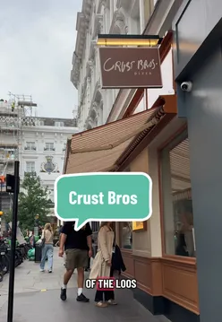 Delicious pizza and stylish restroom at Crust Bros in Covent Garden, London, rated 4/5 stars.