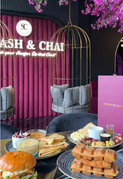 Brunch at Smash & Chai on Edgware Road, featuring pink Kashmiri chai and Karak chai in a lively setting.
