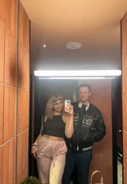 Guests enjoying creative cocktails at Sisi rooftop bar during Glasgow Cocktail Week in Merchant City.