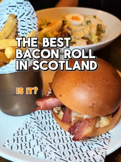 Delicious bacon roll from The Noble in Glasgow City Centre, showcasing Scotland's best breakfast delight.