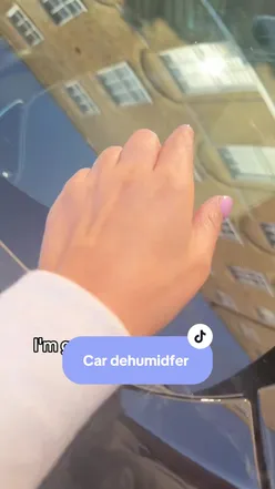 Car dehumidifier reducing damp and condensation in vehicle on chilly mornings for improved comfort and air quality.