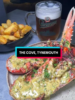 Diners enjoying a diverse À La Carte menu at The Cove, Tynemouth, including lobster thermidor and burrata.
