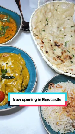 Exterior of Curry Leaf restaurant in Newcastle, showcasing vibrant dining ambiance and inviting entrance.