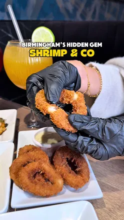 Shrimp & Co's vibrant dining scene showcasing shrimp dishes in Birmingham's hidden gem.