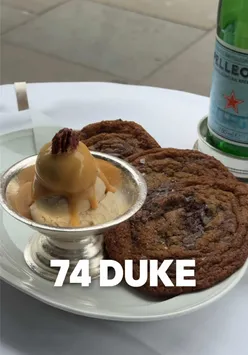 Elegant lunch at 74 Duke in Mayfair featuring wagyu burger, cognac butter prawns, and dessert of cookies and ice cream.