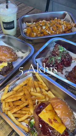 Five Akhis in Birmingham featuring BBQ Sweet One Smash Burger, Chicken Tenders, Cheesy Fries, and a fun mocktail.