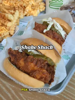 Spicy food lovers enjoying delicious offerings at Shake Shack in St Davidโs Cardiff.