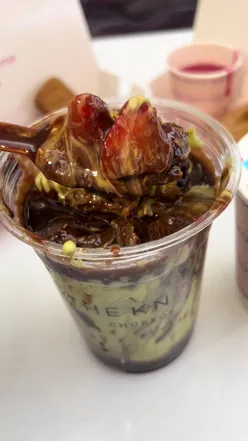 Delicious churros and chocolate strawberry dessert at The Knot Churros, Metro Centre, Newcastle, perfect for shoppers!