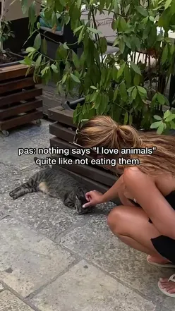 Thoughtful person questioning the ethics of loving vs. eating animals, reflecting on veganism.