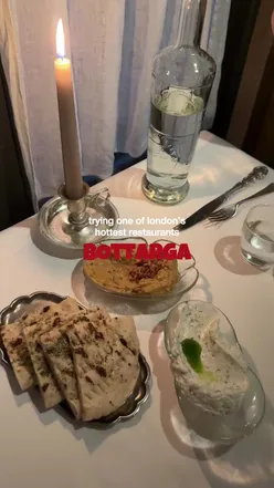 Delicious dishes at Bottarga in Chelsea, including smoked aubergine dip and lamb belly, for a memorable celebration.