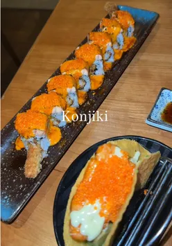 Delicious sushi spread at Konjiki in Kensington: salmon tacos, nigiri, dragon rolls, and rose lemonade.