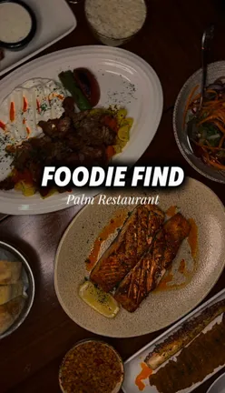 Guests enjoying cocktails and slow-cooked octopus at Palm Restaurant, a Turkish gem in Milton Keynes.