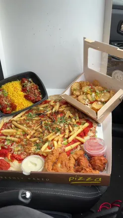 Delicious loaded naan at Chilli Grill in Castlemilk, with a nod to Equal Clothing's inspiring brand.