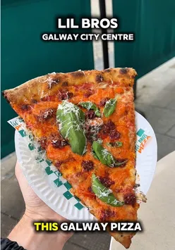 Delicious pizza slice enjoyed at 32 Eyre Square, Galway, thanks to Rolling Retreats NI for the weekend getaway.