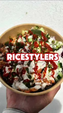 Delicious chicken platter with rice and loaded snack bag featuring Doritos, sauces at Ricestylers in Northolt.