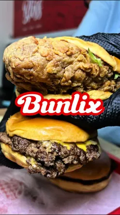 Diners enjoying a variety of burgers and milkshakes at Bunlix in Hampden Park, Eastbourne, known for its indulgent menu.