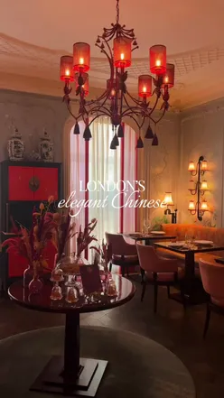 Charming interior of MiMi Mei Fair in Mayfair, featuring dishes like caramelised soy chicken and sweet & sour prawns.