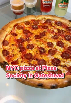 Delicious New York style pizza with crispy crusts and hand-tossed bases at Pizza Society, Gateshead.