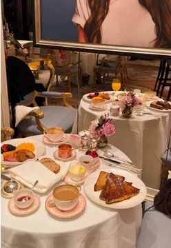 Guests enjoying a luxurious breakfast at The Dorchester, a premier London hotel restaurant.
